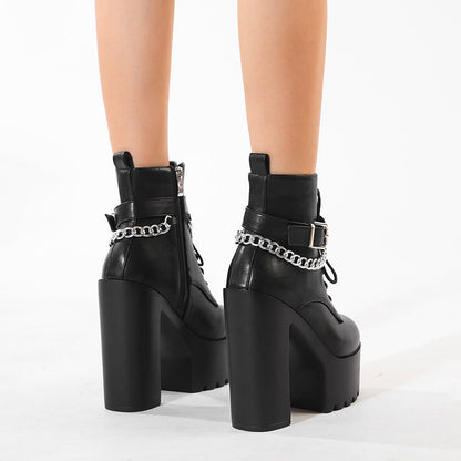 Women's chunky-heel platform booties with zipper by Hexa Noir