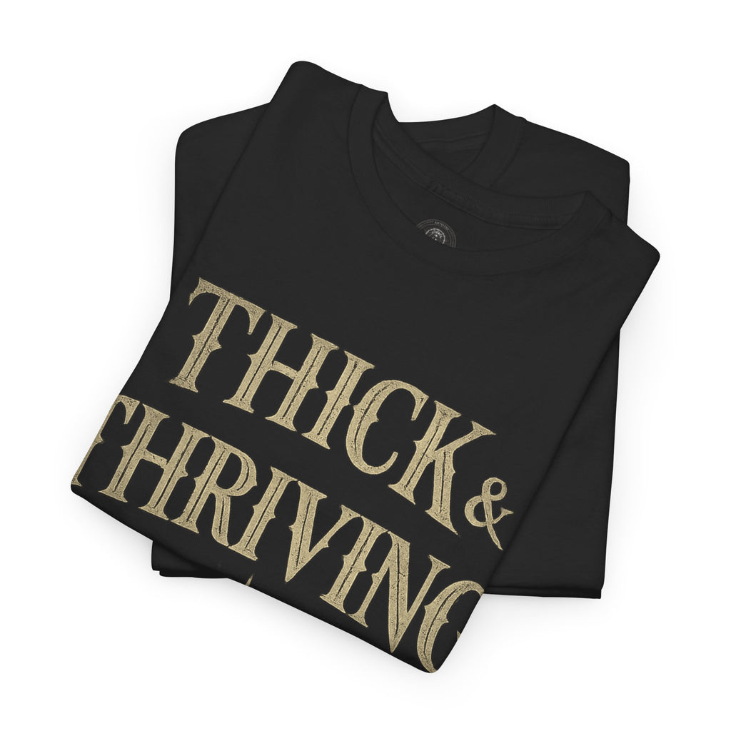 Thick & Thriving Graphic Tee — Bold Gothic Lettering with Distressed X Back