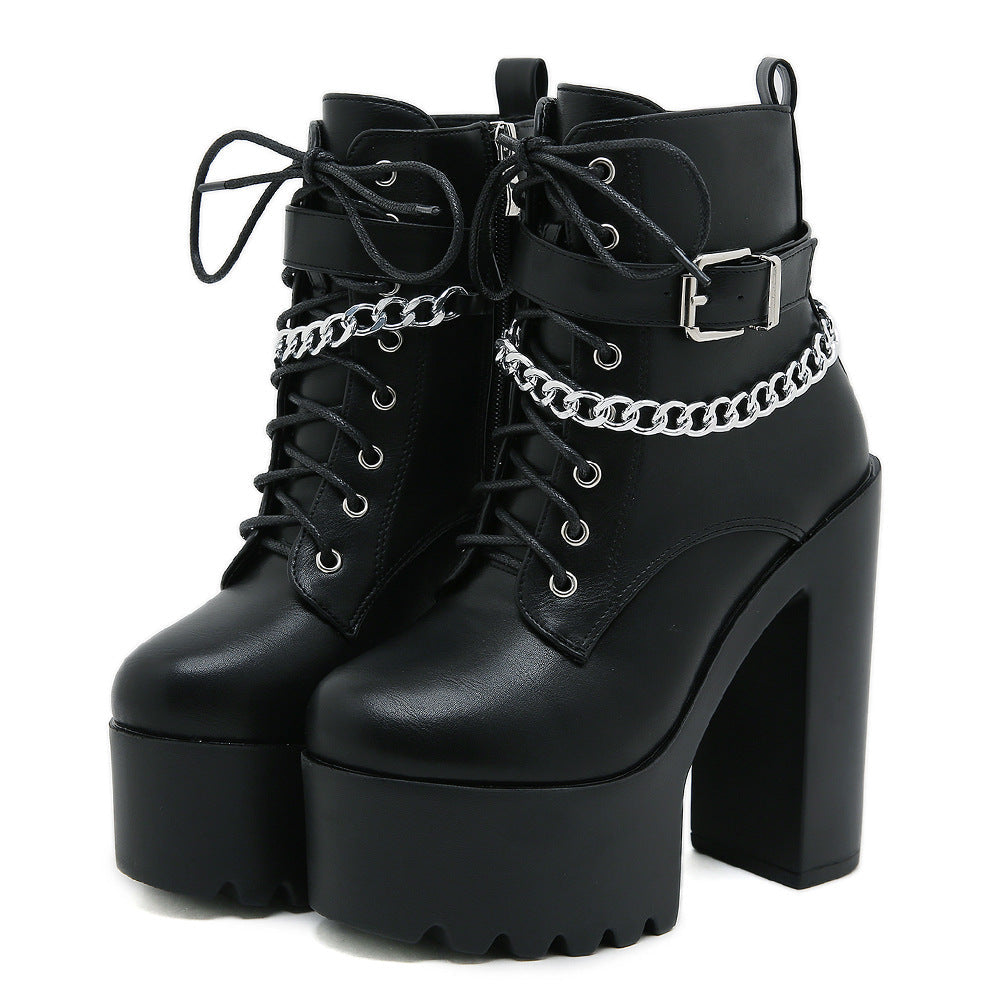 Women's chunky-heel platform booties with zipper by Hexa Noir