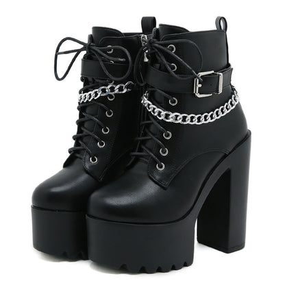 Women's chunky-heel platform booties with zipper by Hexa Noir