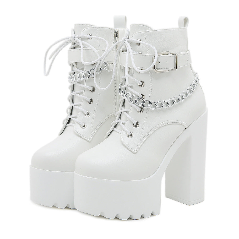 Women's chunky-heel platform booties with zipper by Hexa Noir
