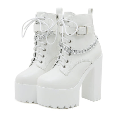 Women's chunky-heel platform booties with zipper by Hexa Noir
